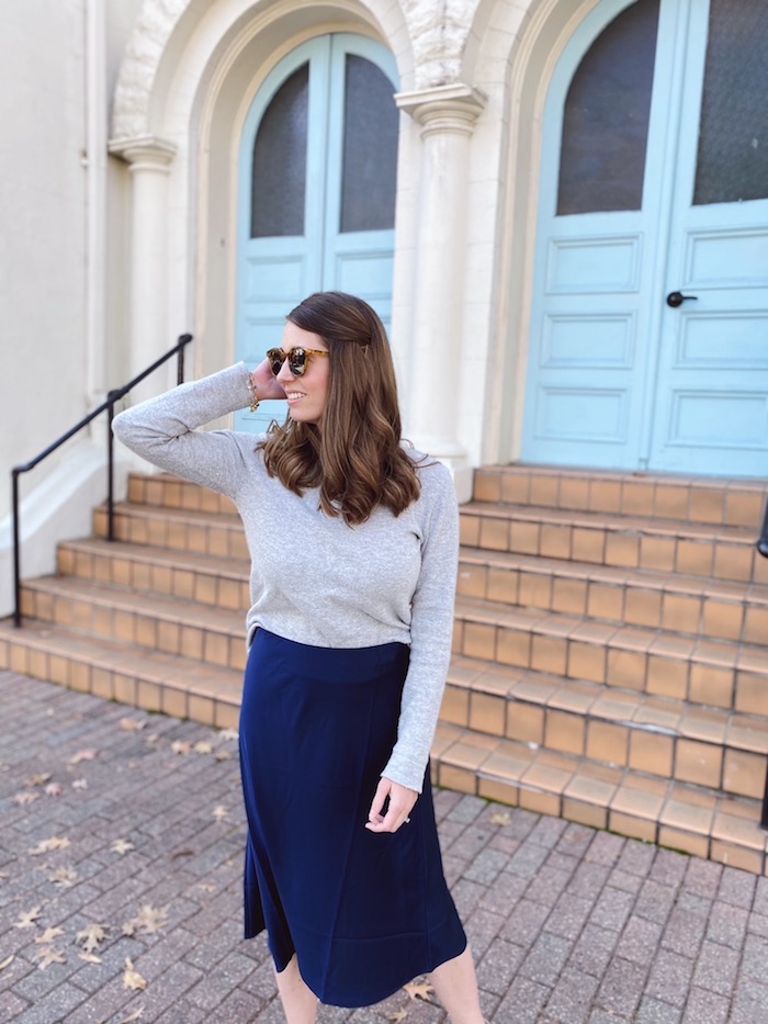How to style a navy slip skirt in winter